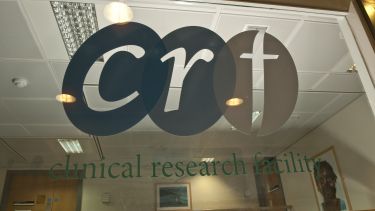 CRF Clinical research glass logo