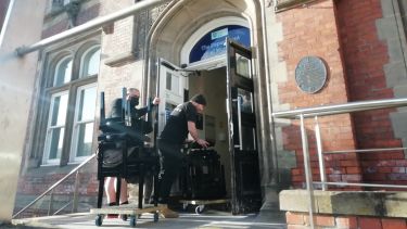 Pianos being moved into the Jessop building 