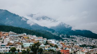 Town in front of hills in Quito, Ecuador