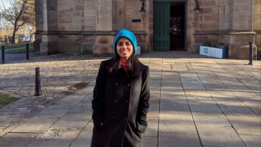 Lavanya Balasubramanian, Project Assistant for ASTUTE 2020, stood outside of St George's Church at the University of Sheffield