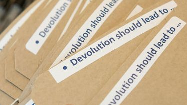 Labels that read 'Devolution should lead to...'