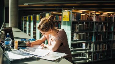 A student studying in library