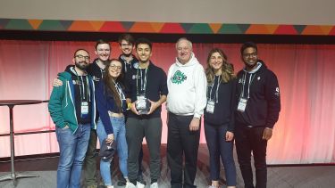 The iGEM team receiving their award