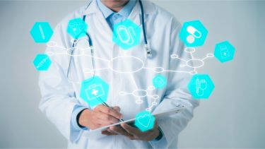 Man in white lab coat with blue medical image graphics