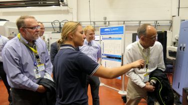 Bethany takes Boeing representatives on a tour of the University of Sheffield Advanced Manufacturing Research Centre.