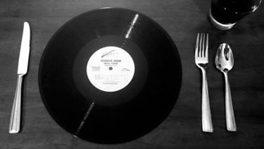 Music record used as a plate on a dining table