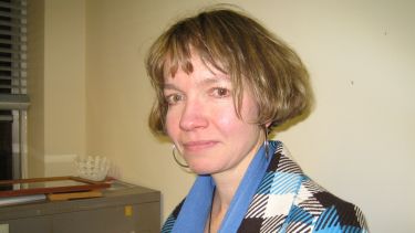 A head and shoulders photograph of Carole Elliott
