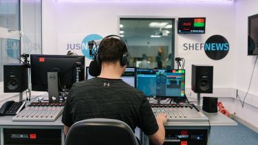Student working in the Sheff news studio