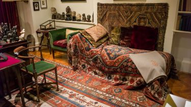 Freud's couch covered in carpet