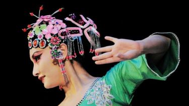Chinese style dance - lady in pose with head garment