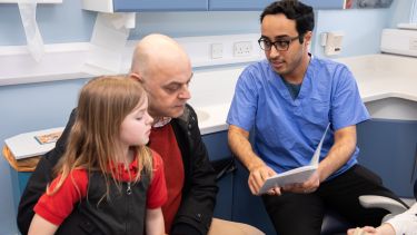 Dental Professional with Young Patient