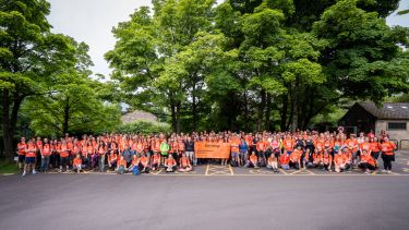 A photo showing hundreds of walkers gathering before the start of the walk