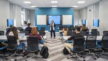 Group of students in small study session in the school of law