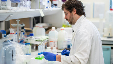 Scientist working in SITraN