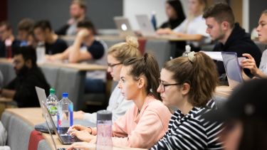 Students in a lecture theatre.