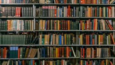 A photo of books in a library