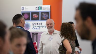 Emeritus Prof Rod Hose and people networking at Insigneo Showcase 2022