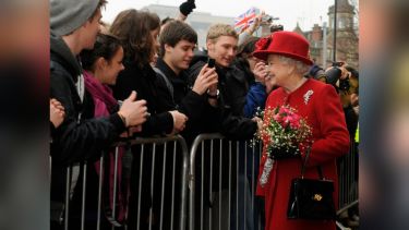 Her Majesty the Queen walking past the public during her visit in 2010.