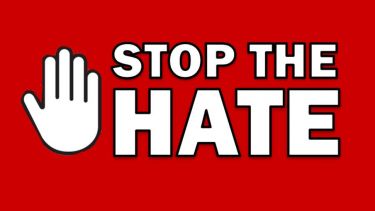 The words stop the hate and a flat hand icon