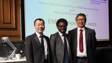 Photograph taken at the Electrical Machines and Drives Symposium, 2022. Photograph from left to right includes Counsellor for IEEE Student Branch, Dr. Xiao Chen, PhD candidate and IEEE Student Branch Chair, Yinka Leo Ogundiran, and University of Sheffield Professor Zi-Qiang Zhu who delivered the keynote speech at the event