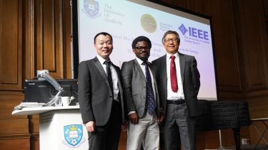 Photograph taken at the Electrical Machines and Drives Symposium, 2022. Photograph from left to right includes Counsellor for IEEE Student Branch, Dr. Xiao Chen, PhD candidate and IEEE Student Branch Chair, Yinka Leo Ogundiran, and University of Sheffield Professor Zi-Qiang Zhu who delivered a keynote speech at the event