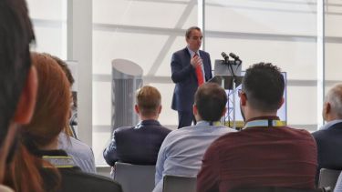 Photograph of FEMM Hub Director and Electronic and Electrical Engineering Professor, Geraint Jewell, speaking at the FEMM Hub 2022 conference