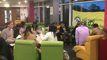 Sino-English Club members speak together