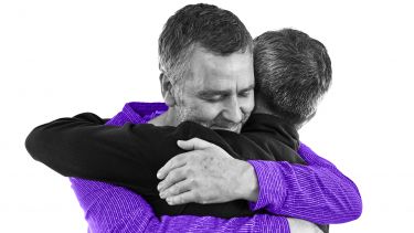 two men hugging