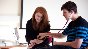 Students practicing with Equipment