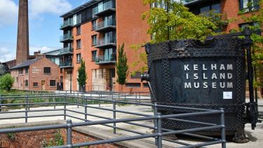 The Kelham Island Museum from outside, displaying the large sign featuring the museum's name