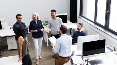 A team having a discussion in an office.