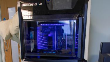 A Stratasys DentaJet 5 printing machine