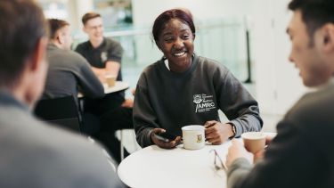 Apprentices having a cup of coffee and chatting at the AMRC Training Centre