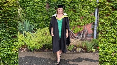 Alumna Lauren Dakin on her graduation day in 2022