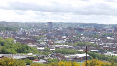 A view of the Arts Tower and the hills of Sheffield