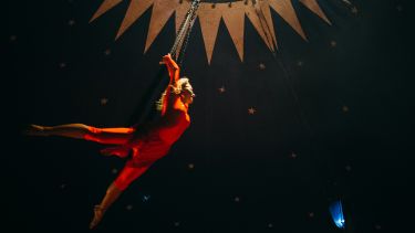 Photograph of a female aerialist