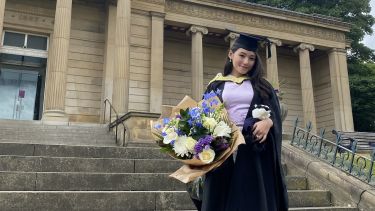 May Than Thar Cho outside Weston Park Museum on graduation day.