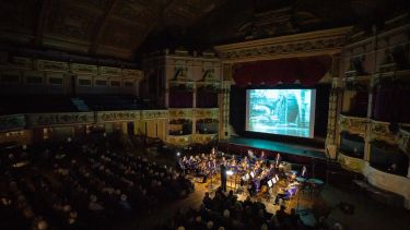 A view of the inside of Morecambe Winter Gardens from a balcony during a classical music concert
