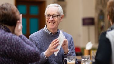 Sheffield alumnus smiling at an event