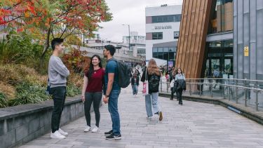 Students on campus outside the Students' Union. 