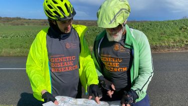 Owen and Peter Jones in their 'Fundraising for Genetic Disease Research' t-shirts