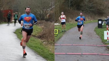 Neil Jones running in a Superman top