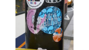 Details showing graffiti stickers at a Crossing point
