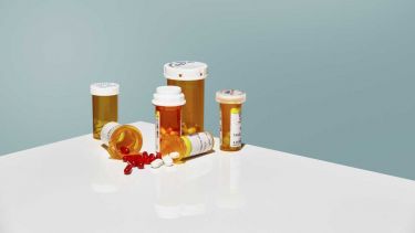 Image of filled bottles of medical pills