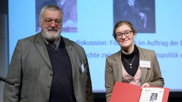 Image of MA student Emily Calcraft receiving Matthias Erzberger Prize