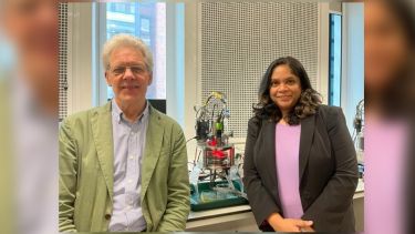 Dr Jordan MacInnes and Dr Esther Karunakaran stood with their prototype bioreactor