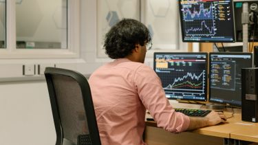 Sahil working in the Trading Room