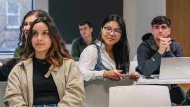 A diverse group of students in a seminar.