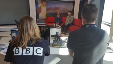 Students in a BBC working in the BBC studio