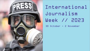 International Journalism Week 2023. 30 October to 3 November. A man wearing a helmet and gas mask clearly marked with the word 'PRESS'